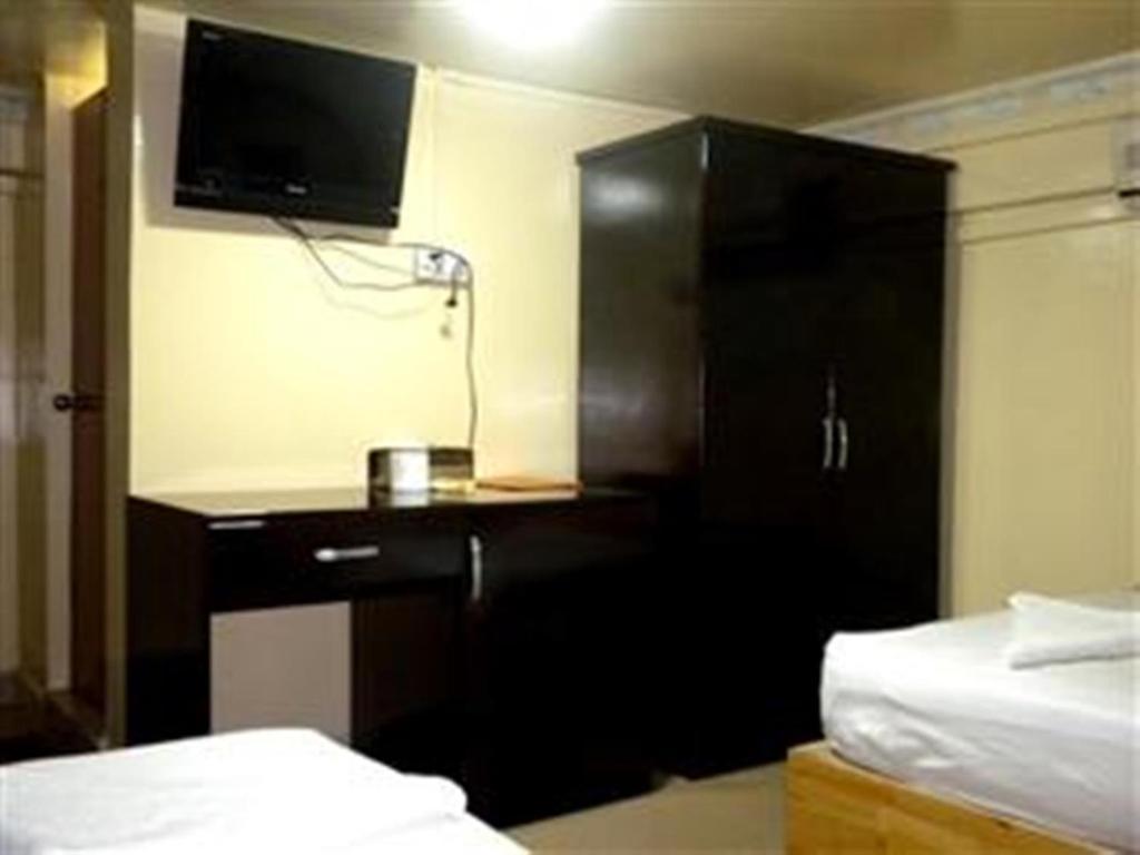 Golden Boat Guesthouse Phnom Penh Quarto foto