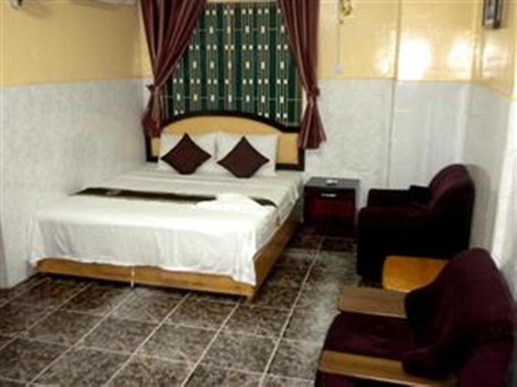 Golden Boat Guesthouse Phnom Penh Quarto foto